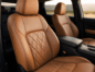 Custom tan Katzkin leather seats inside a modern vehicle