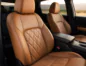 Custom tan Katzkin leather seats inside a modern vehicle